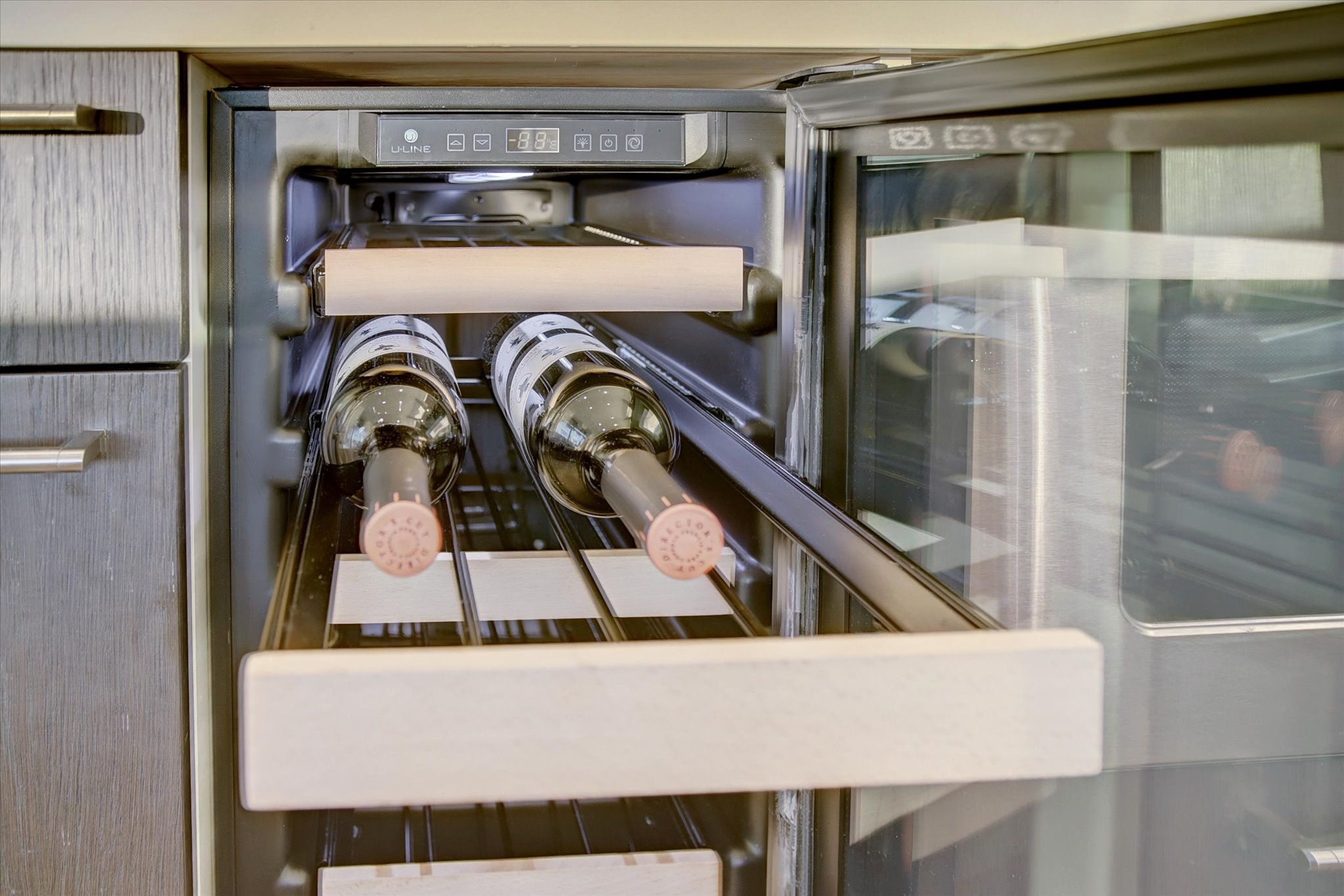 1211 Caroline Street, Unit 2002 Houston, TX 77002 - Photo 7 of 31 Wine fridge in the kitchen.