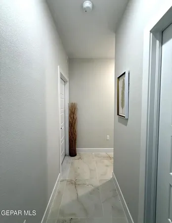 a bathroom with a toilet a sink and shower