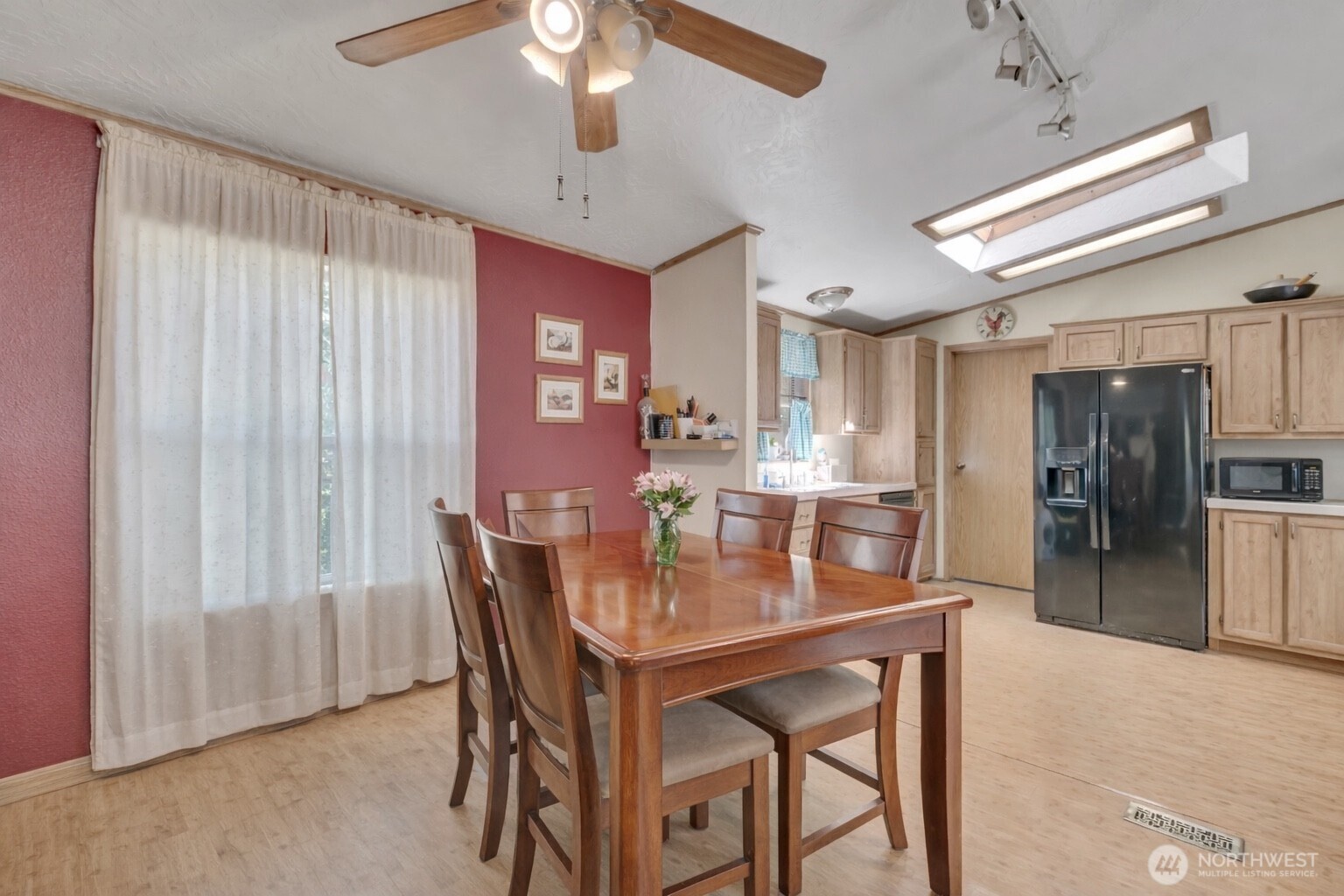 1507 286th Street East Roy, WA 98580 - Photo 11 of 22 a dining room with furniture and window