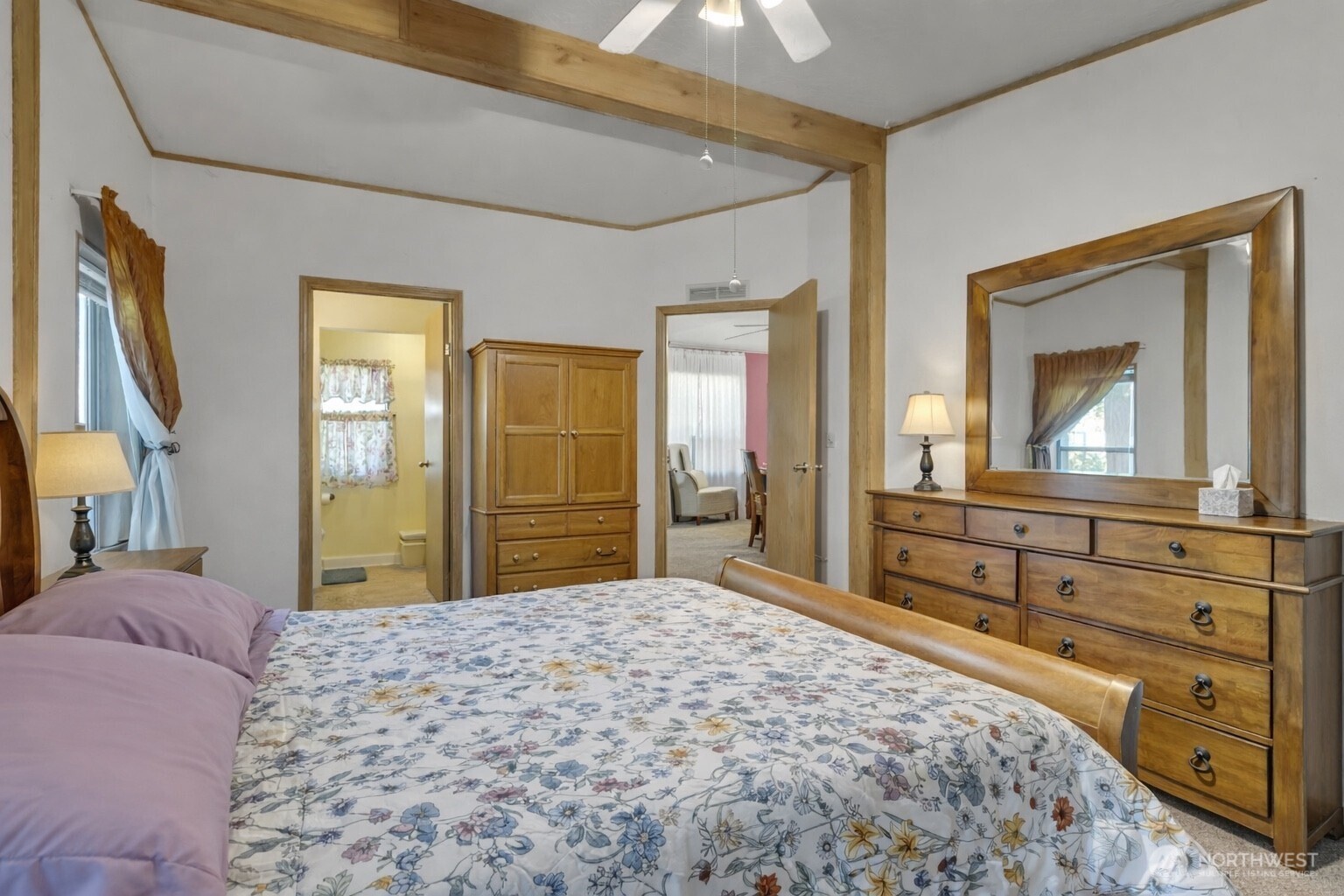1507 286th Street East Roy, WA 98580 - Photo 13 of 22 a bedroom with a bed and a dresser
