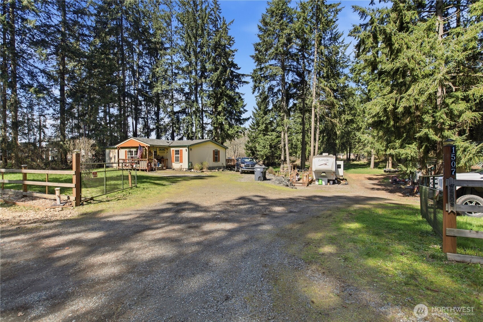 1507 286th Street East Roy, WA 98580 - Photo 2 of 22 a view of a park with swings and slides
