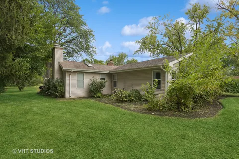 a view of a house with a garden