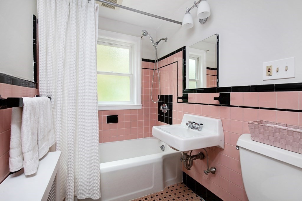 496 Marrett Road Lexington, MA 02421 - Photo 16 of 25 a bathroom with a sink toilet and shower