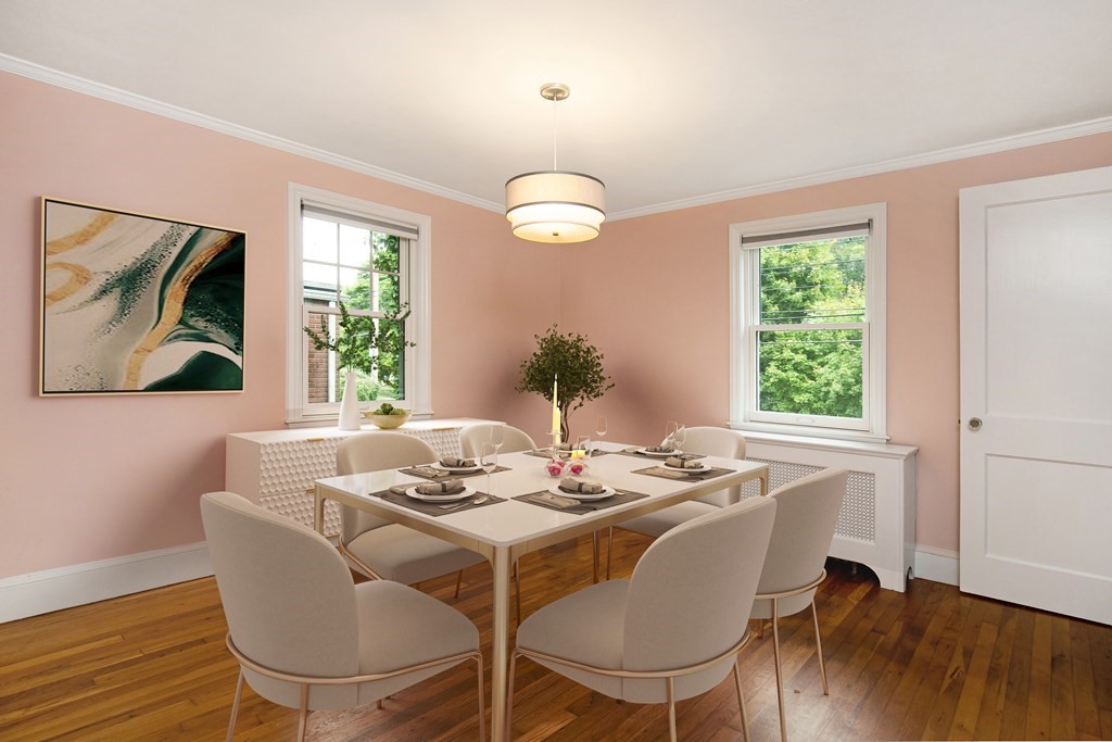 496 Marrett Road Lexington, MA 02421 - Photo 8 of 25 a dining room with furniture a chandelier and wooden floor
