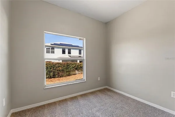 an empty room with a window