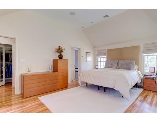 47 Draper Road Wayland, MA 01778 - Photo 12 of 26 a spacious bedroom with a bed and a dresser