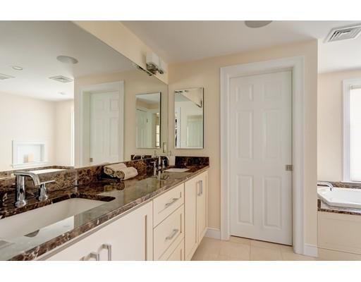 47 Draper Road Wayland, MA 01778 - Photo 14 of 26 a bathroom with a sink and a mirror