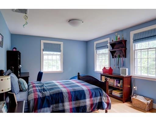 47 Draper Road Wayland, MA 01778 - Photo 18 of 26 a bed room with a bed and a window