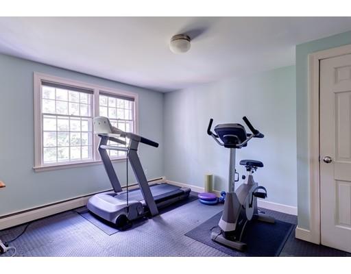 47 Draper Road Wayland, MA 01778 - Photo 20 of 26 a room with gym equipment and windows