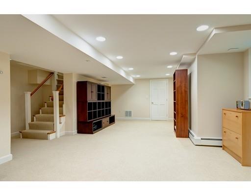 47 Draper Road Wayland, MA 01778 - Photo 21 of 26 a view of an empty room with closet and cabinet