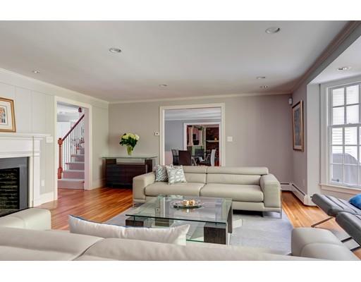 47 Draper Road Wayland, MA 01778 - Photo 3 of 26 a living room with furniture and a fireplace