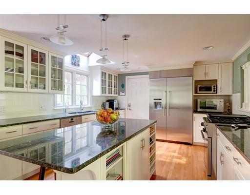 47 Draper Road Wayland, MA 01778 - Photo 7 of 26 a kitchen with stainless steel appliances granite countertop a sink and a stove