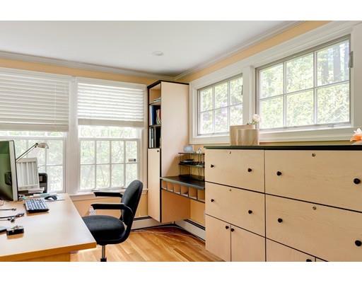 47 Draper Road Wayland, MA 01778 - Photo 10 of 26 a kitchen with stainless steel appliances kitchen island granite countertop a sink and cabinets