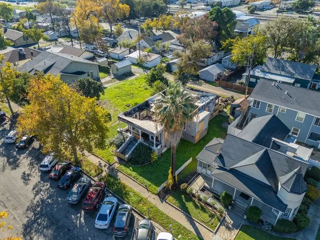 an aerial view of a house with a garden