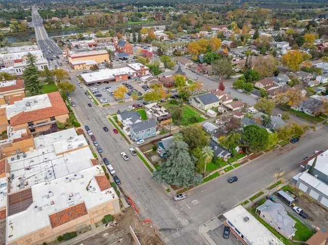 an aerial view of residential houses with outdoor space