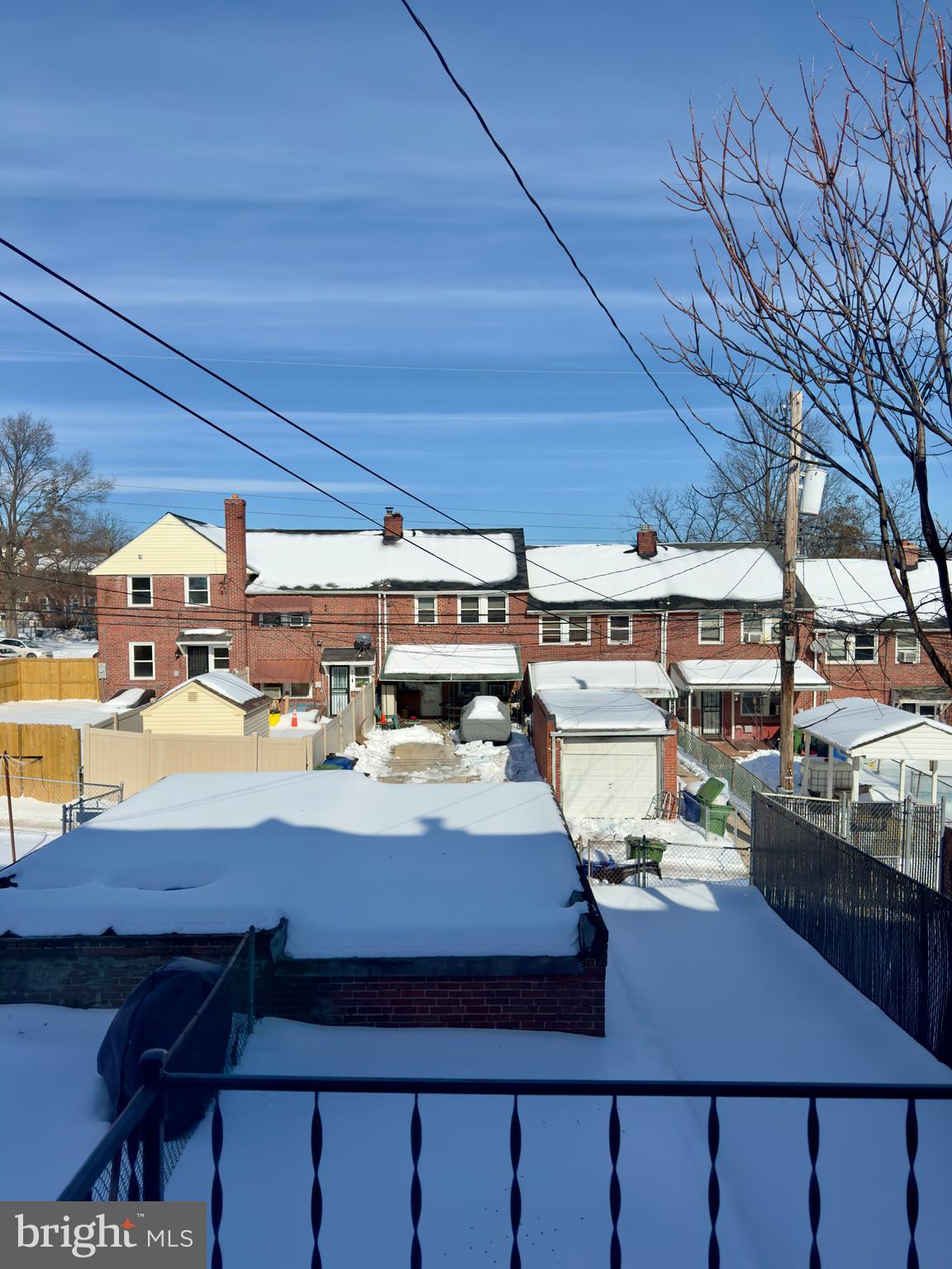 902 Andover Road Baltimore, MD 21218 - Photo 2 of 22 a view of a balcony with table and chairs