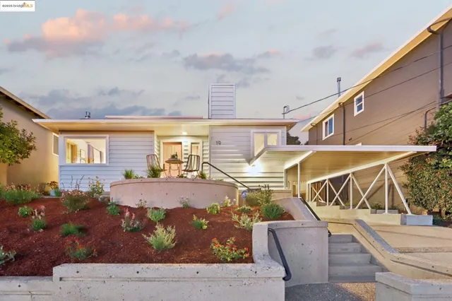 a view of a patio with furniture and backyard