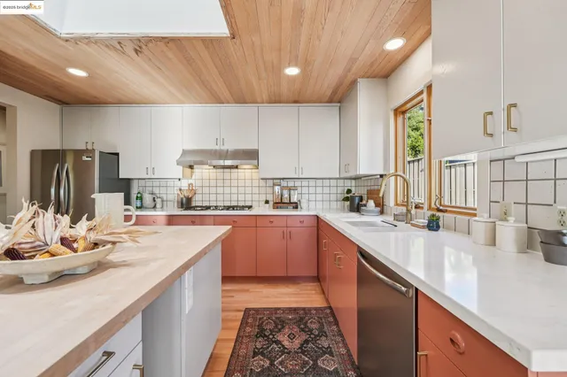 a kitchen with a sink and a window