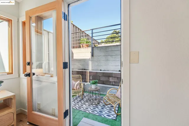 a bedroom with bed and a potted plant