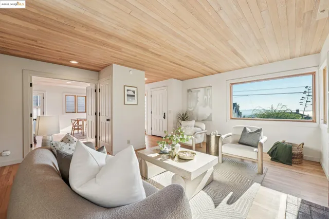 a living room with furniture and a table