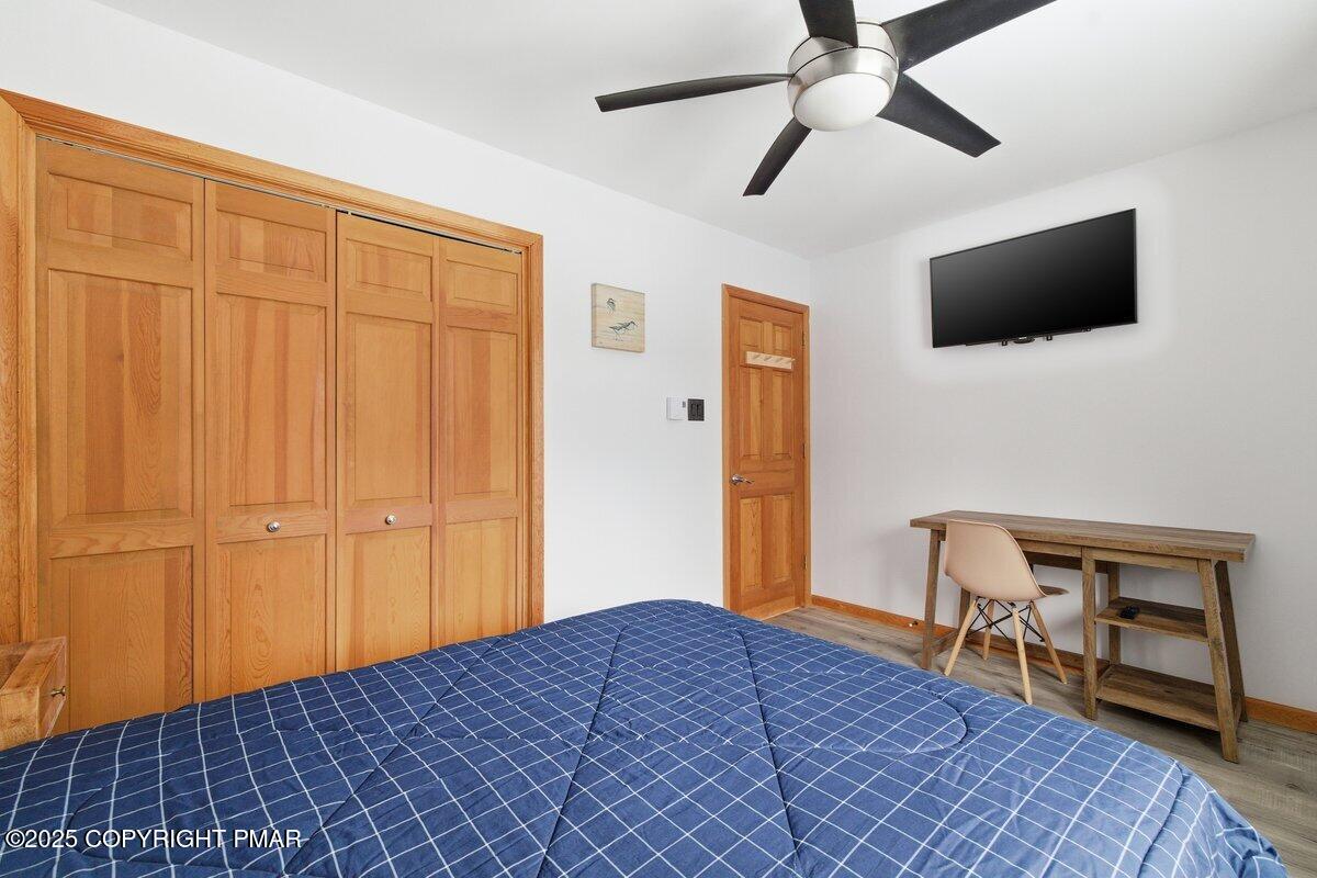 2260 Apley Court Bushkill, PA 18324 - Photo 15 of 44 a bedroom with a bed and a flat screen tv