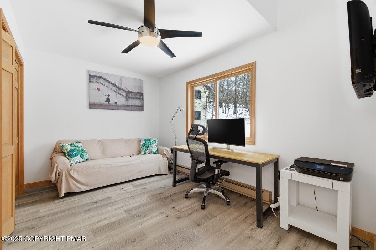 2260 Apley Court Bushkill, PA 18324 - Photo 23 of 44 a living room with furniture and a flat screen tv