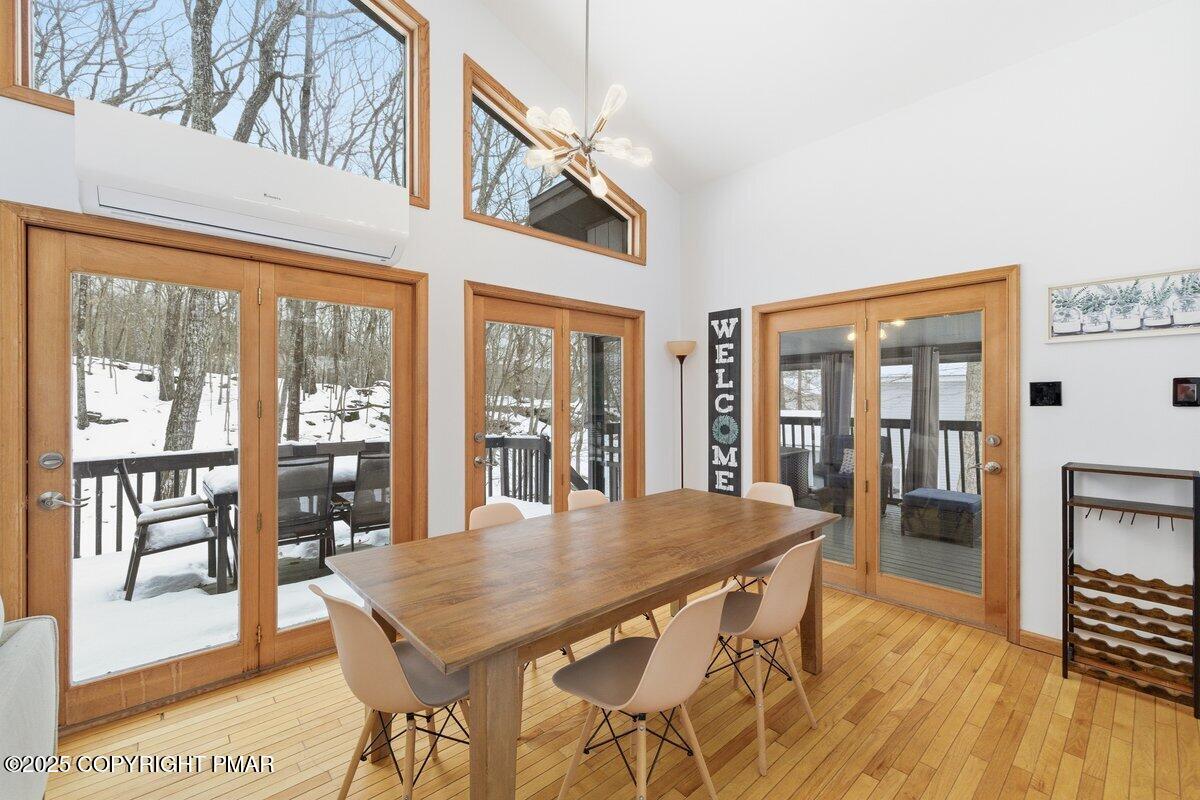 2260 Apley Court Bushkill, PA 18324 - Photo 4 of 44 a view of a dining room with furniture window and wooden floor