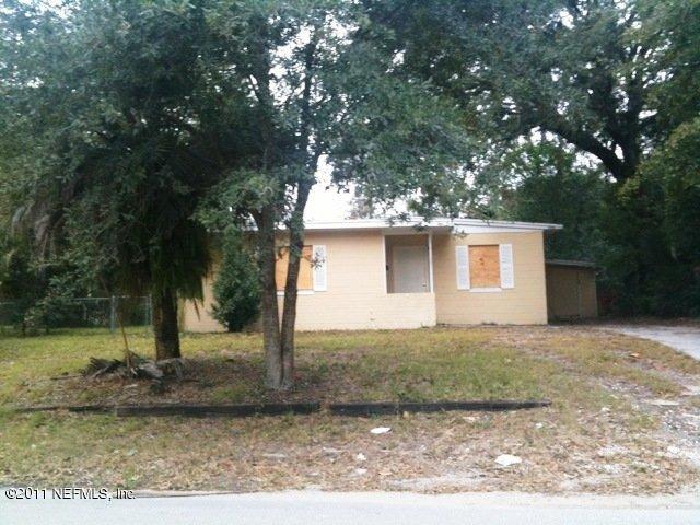 1420 King Arthur Road Jacksonville, FL 32211 - Photo 1 of 7 a view of a house with a yard