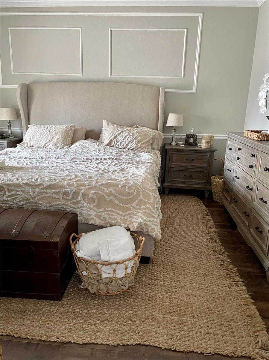 3121 Southeast 2nd Drive Homestead, FL 33033 - Photo 11 of 43 a bedroom with a bed and a window