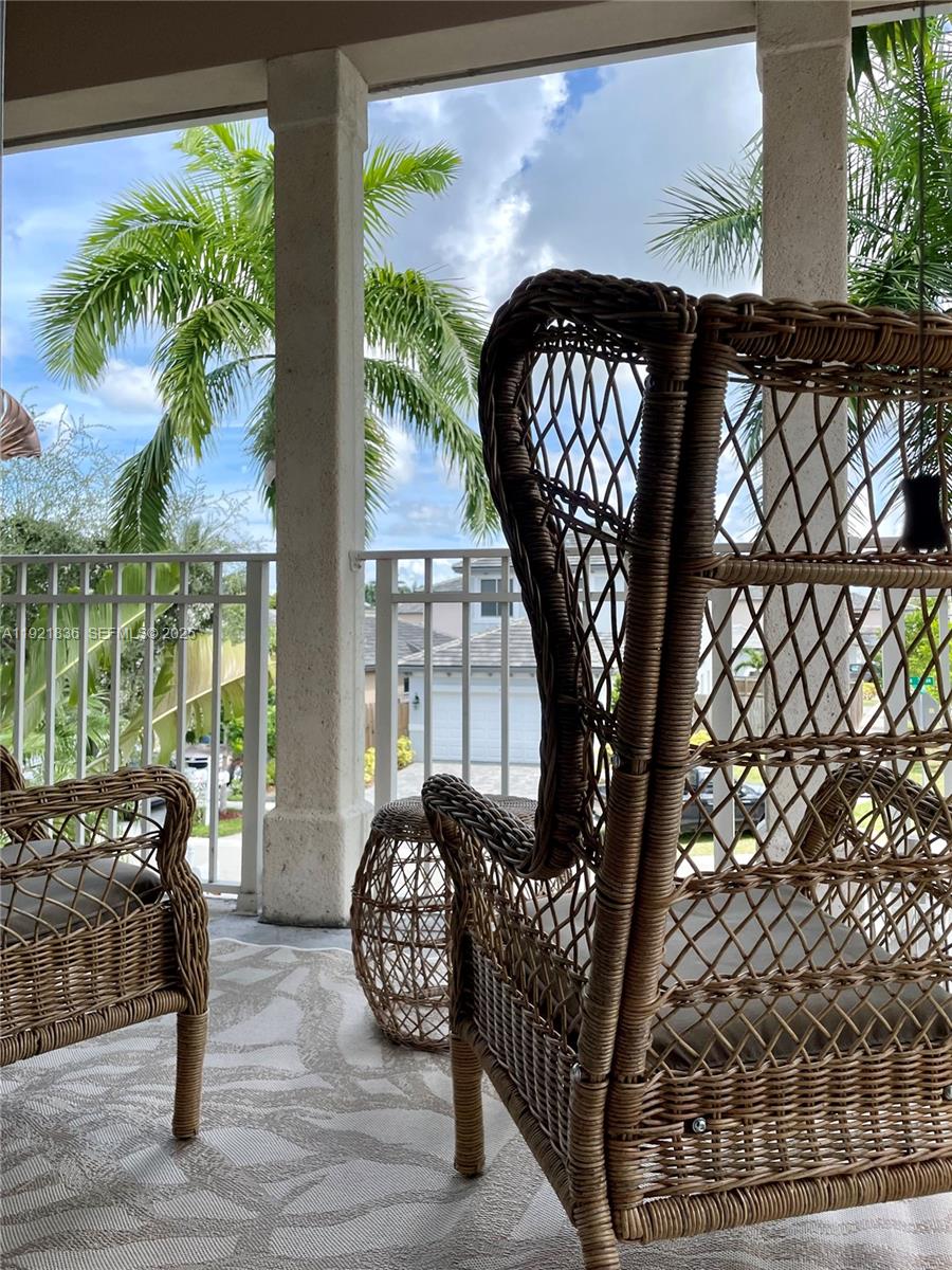 3121 Southeast 2nd Drive Homestead, FL 33033 - Photo 14 of 43 a view of balcony with a swing