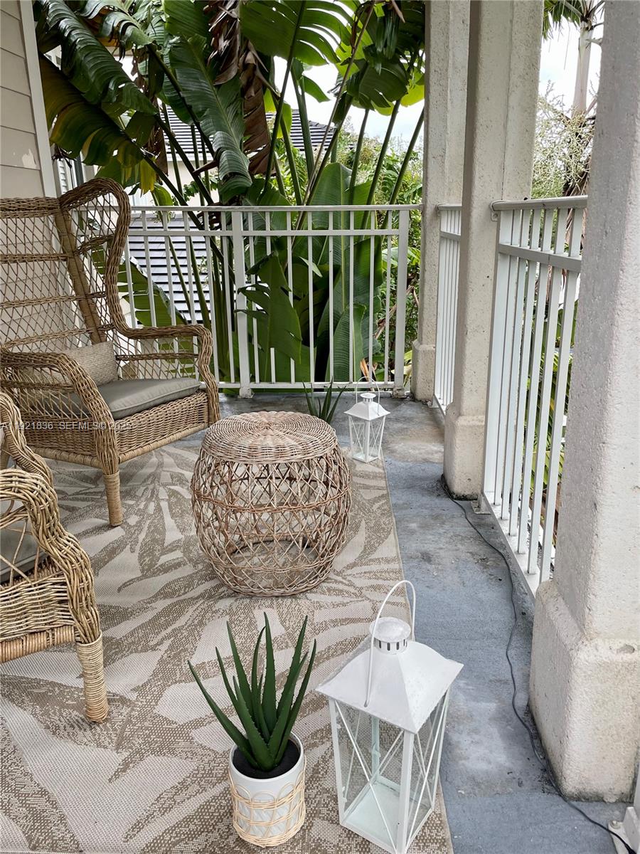 3121 Southeast 2nd Drive Homestead, FL 33033 - Photo 15 of 43 a living room with patio furniture and a potted plants