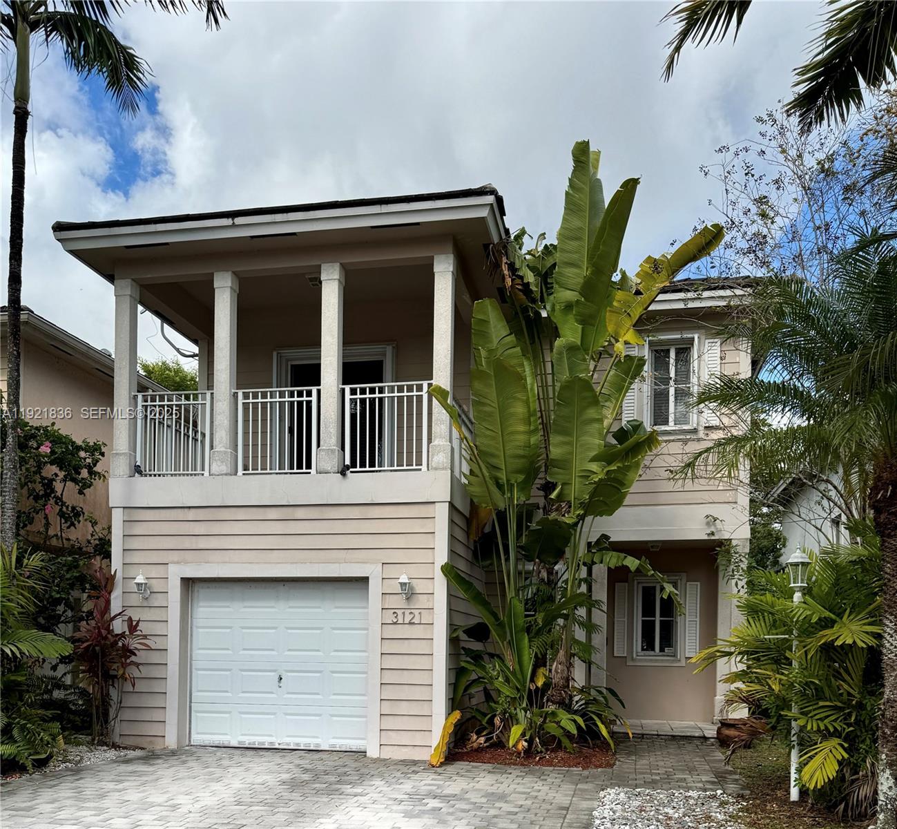 3121 Southeast 2nd Drive Homestead, FL 33033 - Photo 2 of 43 a house view with a garden space