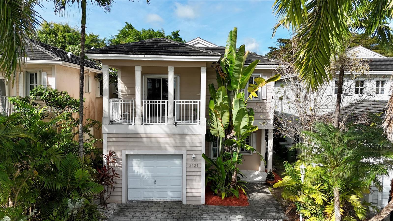3121 Southeast 2nd Drive Homestead, FL 33033 - Photo 33 of 43 a front view of house with yard and green space