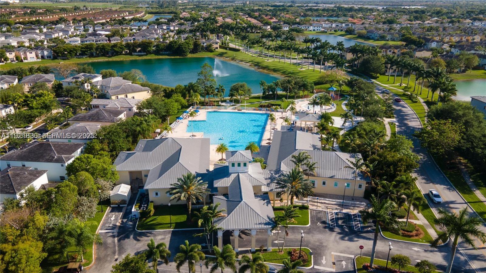 3121 Southeast 2nd Drive Homestead, FL 33033 - Photo 39 of 43 an aerial view of residential houses with outdoor space and lake view