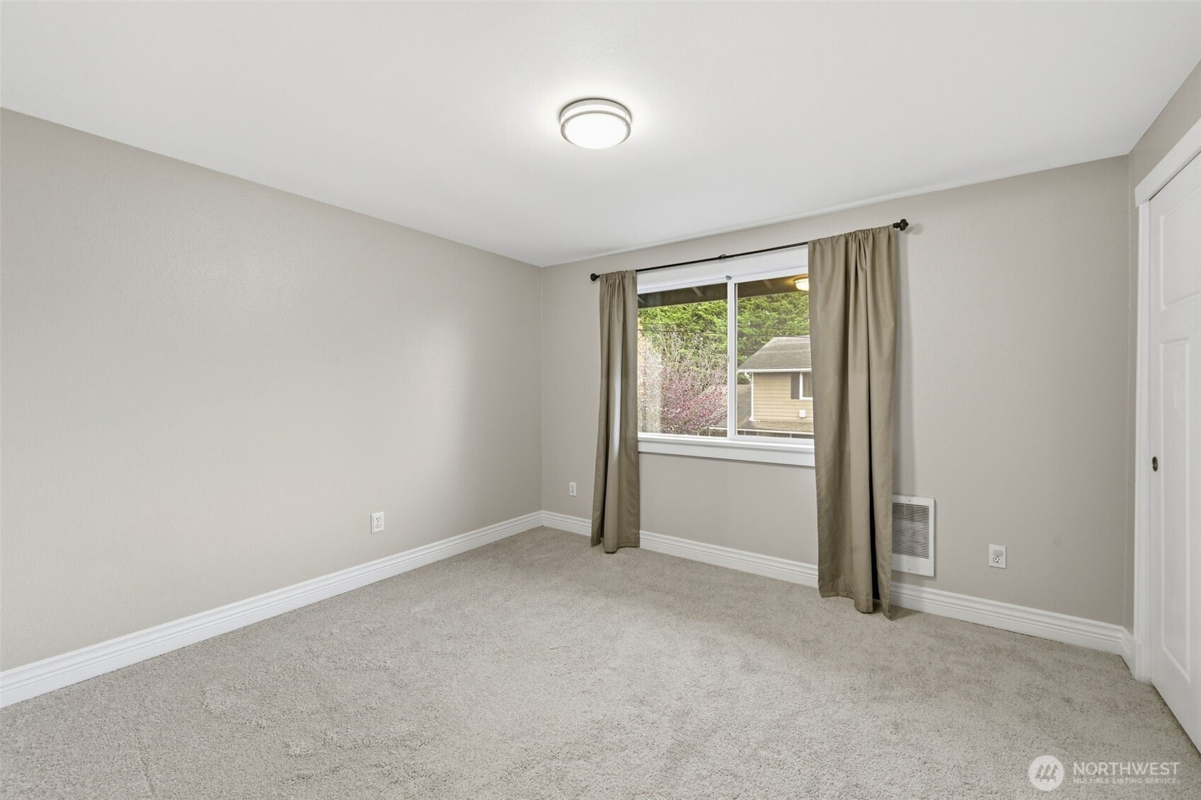 1721 Madison Street, Unit F Everett, WA 98203 - Photo 16 of 36 a view of an empty room with a window