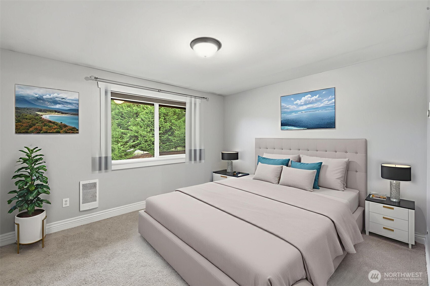 1721 Madison Street, Unit F Everett, WA 98203 - Photo 19 of 36 a bedroom with bed and a potted plant