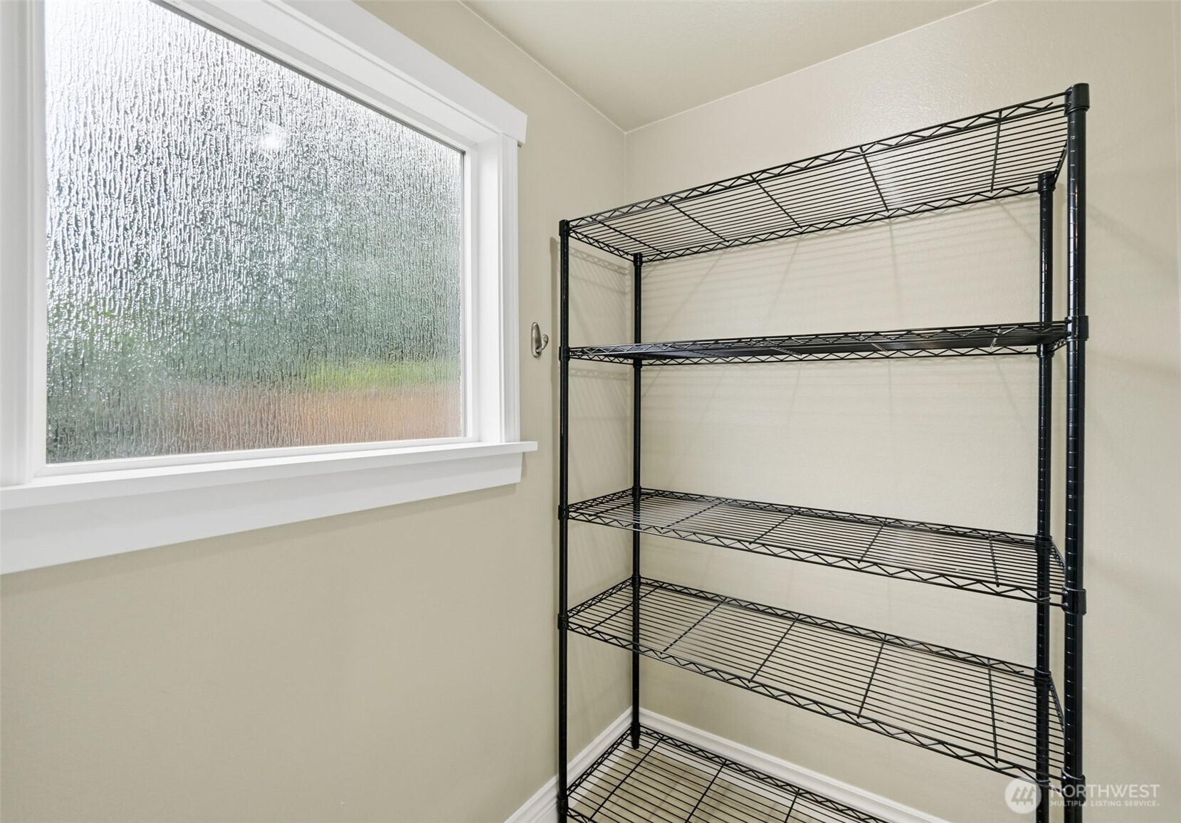 1721 Madison Street, Unit F Everett, WA 98203 - Photo 24 of 36 a bathroom with a glass shower door