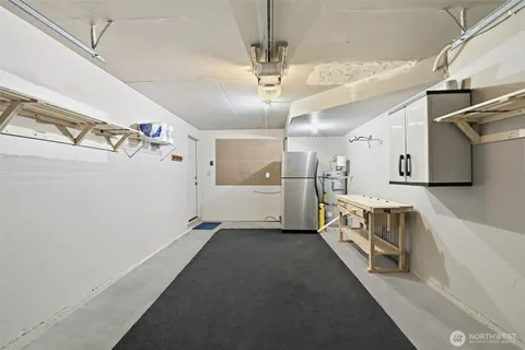 a view of a refrigerator and window