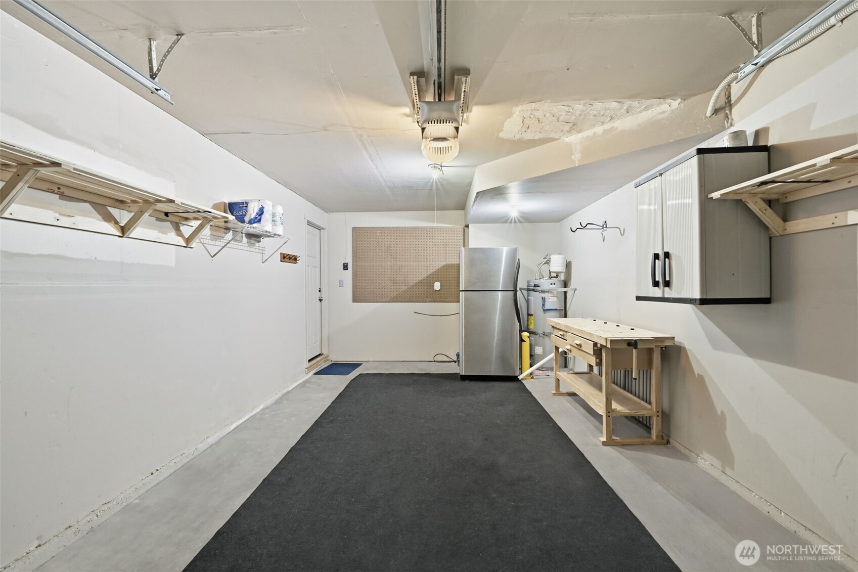 1721 Madison Street, Unit F Everett, WA 98203 - Photo 26 of 36 a view of a refrigerator and window