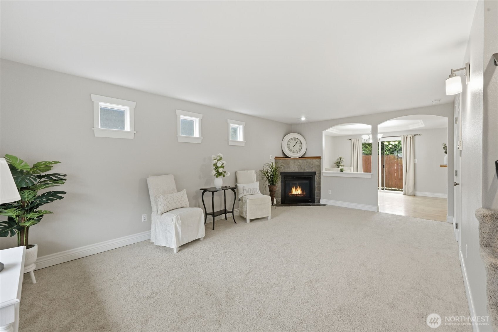 1721 Madison Street, Unit F Everett, WA 98203 - Photo 5 of 36 a view of a livingroom with furniture and a fireplace