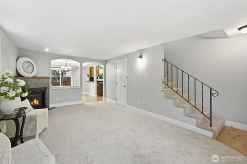 a view of an entryway with wooden floor