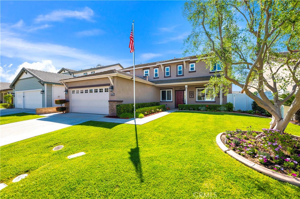 a view of a house with swimming pool yard and patio