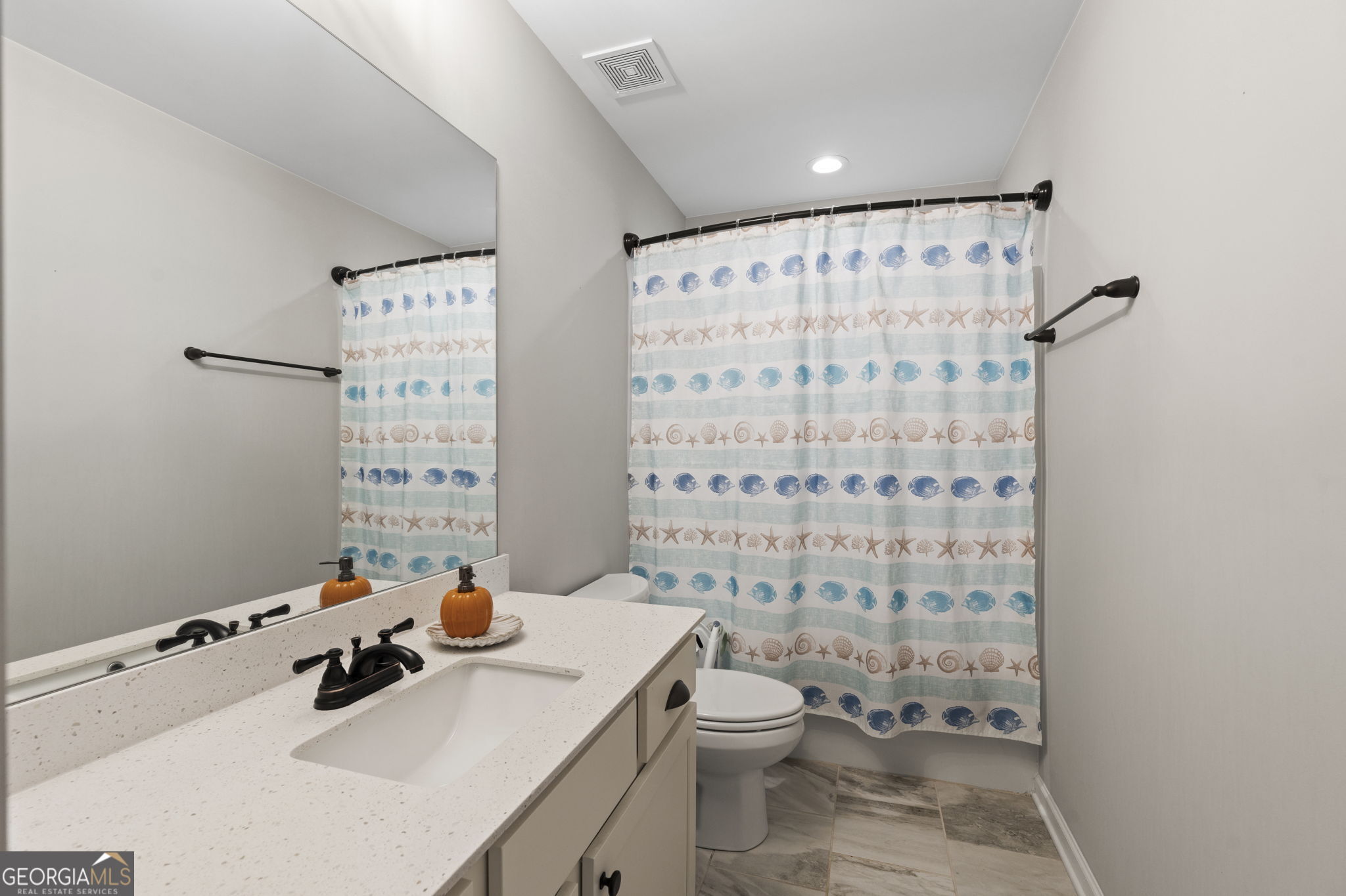 413 Shoshone Circle Kathleen, GA 31047 - Photo 24 of 42 a bathroom with a sink toilet and shower