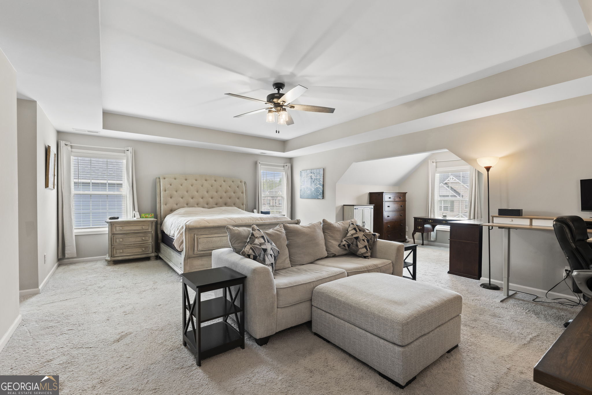 413 Shoshone Circle Kathleen, GA 31047 - Photo 27 of 42 a bedroom with furniture and a chandelier