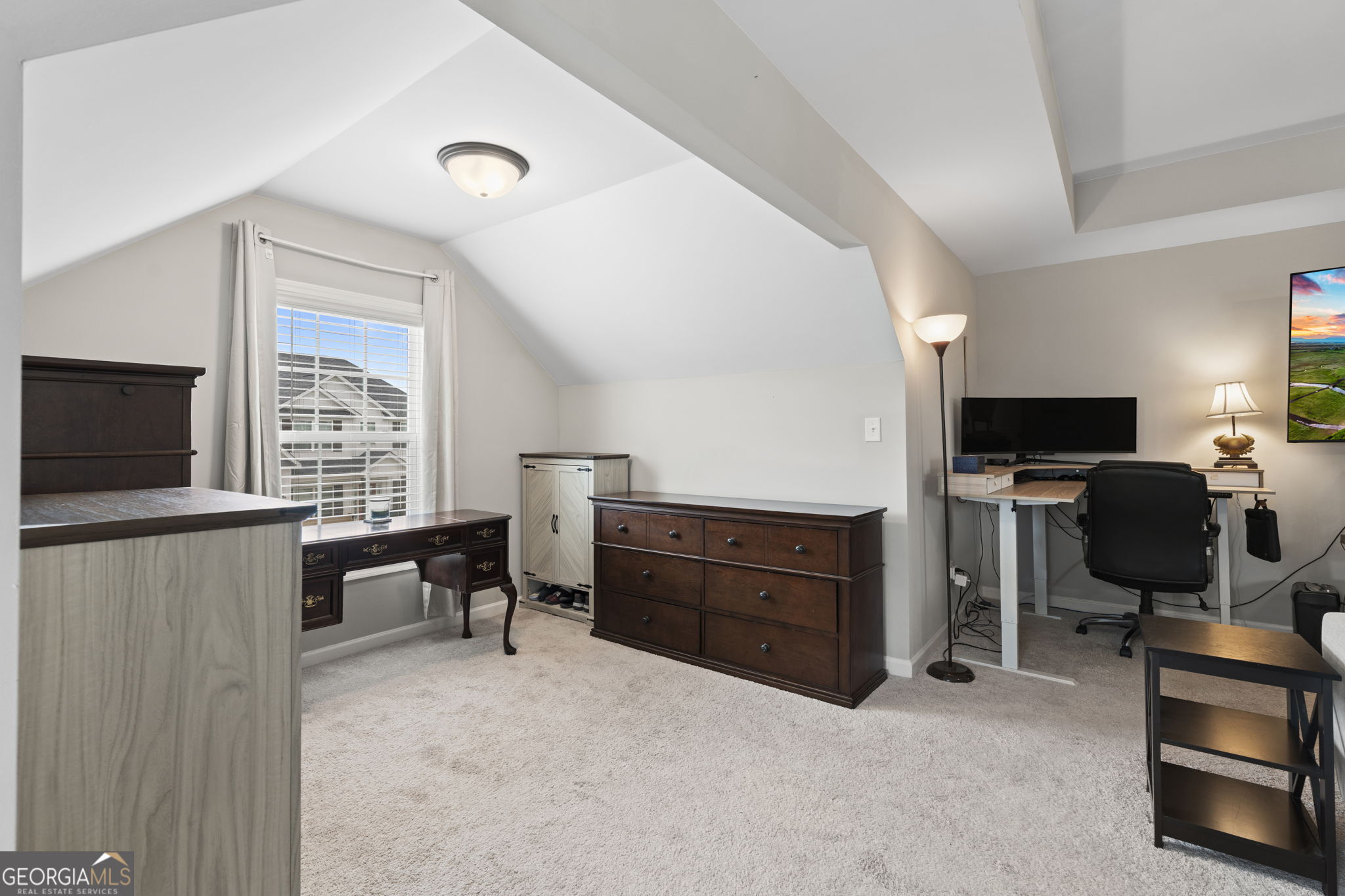 413 Shoshone Circle Kathleen, GA 31047 - Photo 30 of 42 a room with furniture window and a flat screen tv