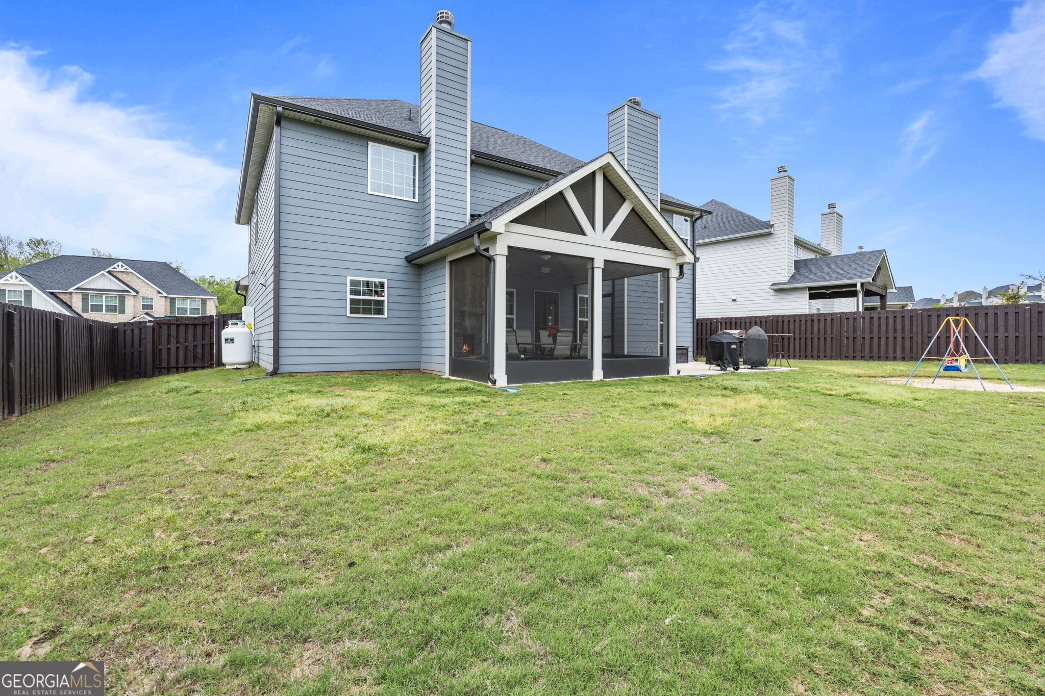 413 Shoshone Circle Kathleen, GA 31047 - Photo 41 of 42 a front view of a house with garden