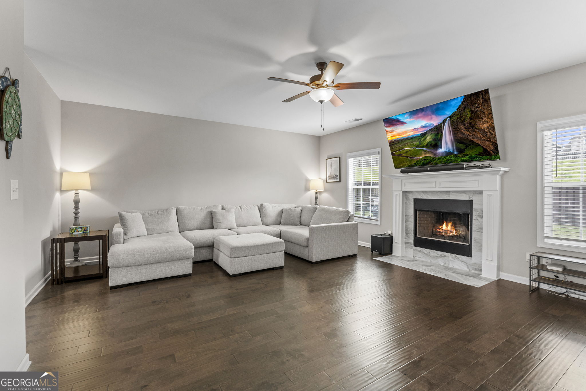 413 Shoshone Circle Kathleen, GA 31047 - Photo 6 of 42 a living room with furniture fireplace and a fireplace