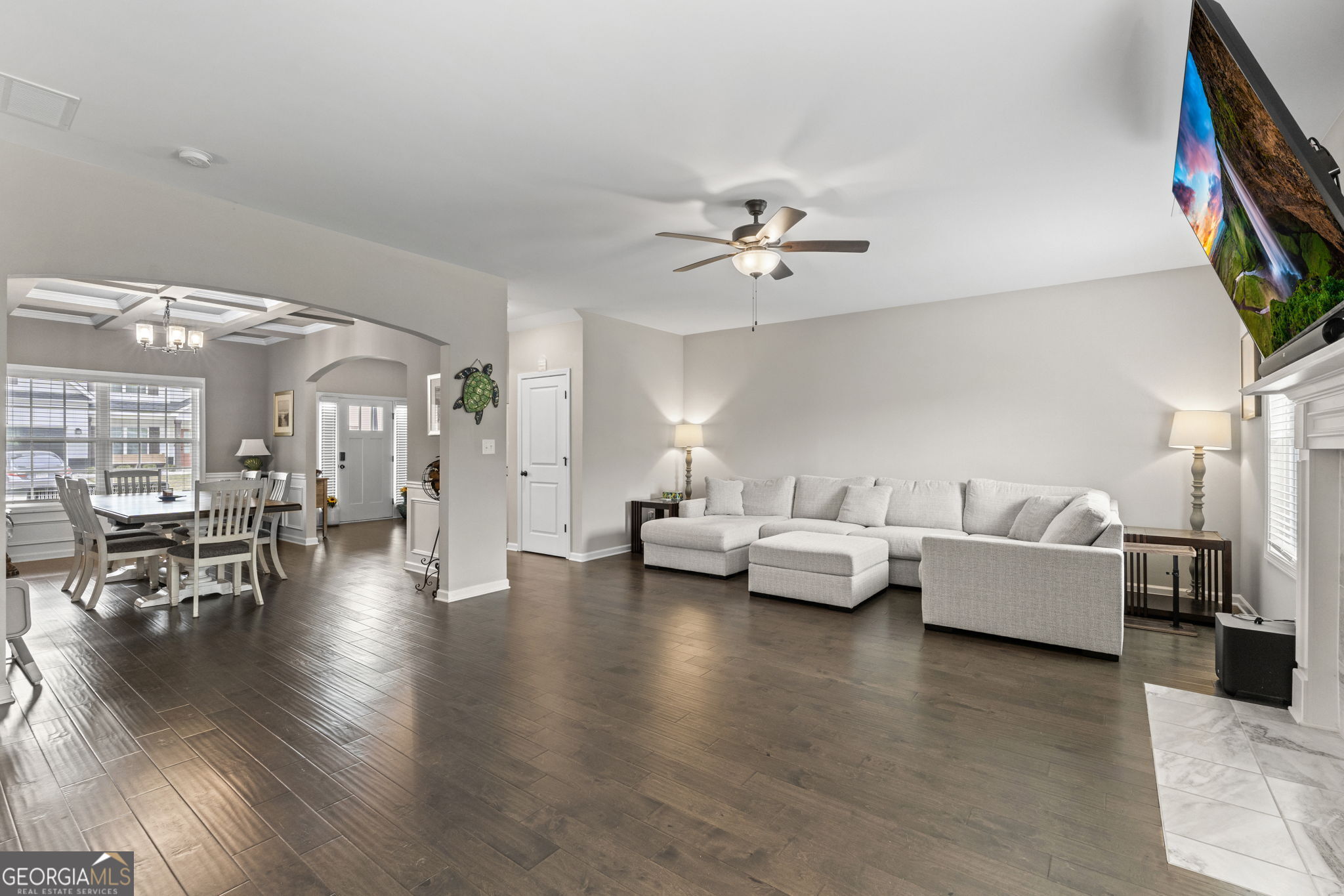 413 Shoshone Circle Kathleen, GA 31047 - Photo 8 of 42 a living room with furniture and a wooden floor
