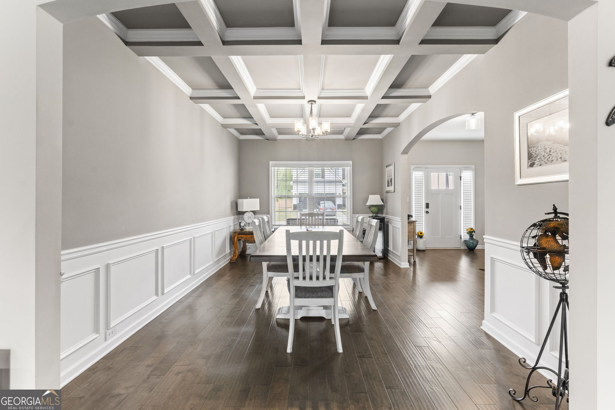 413 Shoshone Circle Kathleen, GA 31047 - Photo 10 of 42 a living room with furniture a dining table and wooden floors