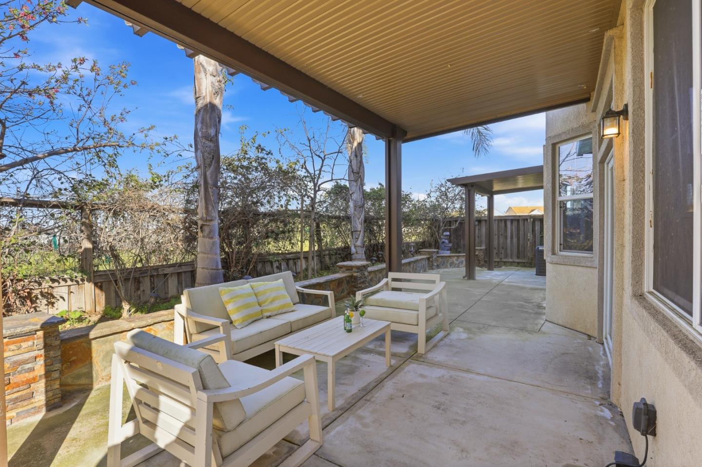 609 Rockspray Circle Pittsburg, CA 94565 - Photo 26 of 43 a building outdoor space with patio furniture and potted plants